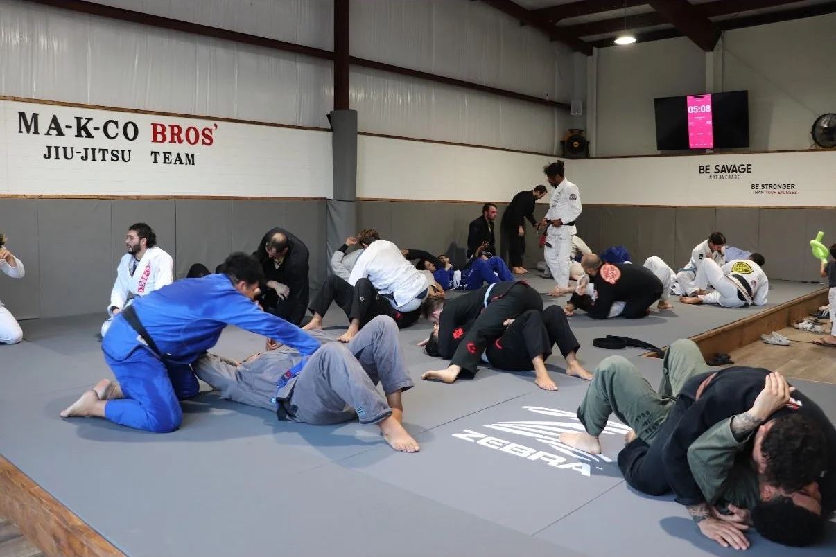 Wide view of the training mats inside Tampa Jiu Jitsu Academy in Tampa, FL